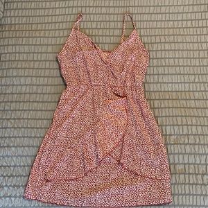 Red and white animal print mini faux wrap dress